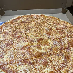 a cheese pizza in a box