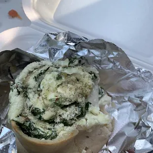 a sandwich wrapped in foil