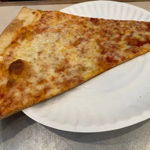 A classic cheese pizza slice. Wish the photo did the taste justice.