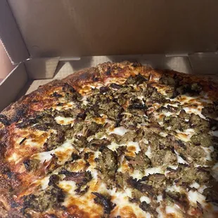 Carnitas pizza. A bit burnt and dry.