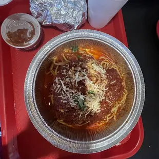 Spaghetti Marinara with two delicious garlic bread knots.
