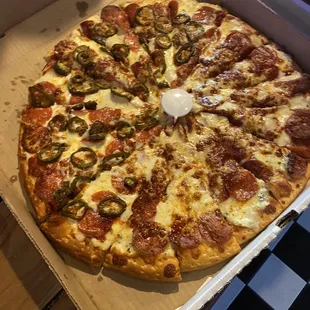 Pepperoni with jalapeño on half
