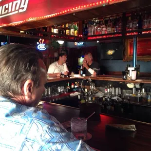 a man sitting at the bar