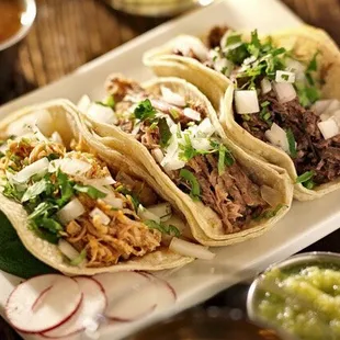 three tacos on a plate