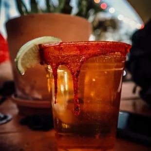 Dos XX with Tajin and chamoy! Outdoor seating with great music!