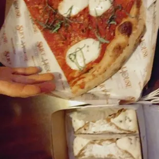 Tony's margherita slice. I had to ask for extra basil