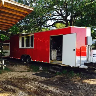 a red and white food truck