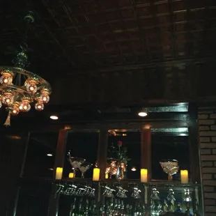 a chandelier and wine glasses