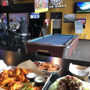 Medium wings, mozzarella sticks, wedge salad. YUM!