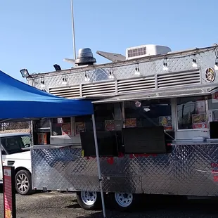 a food truck parked in a parking lot