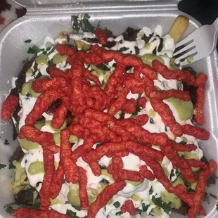 Literally the best tacos and asada fries! I get mine with extra crema and cilantro and grab some hot cheetos to top them