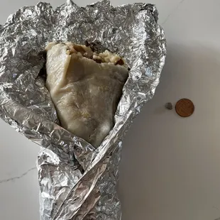 Carnitas burrito with a rock inside that I bit into