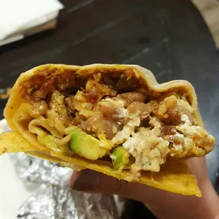 Pastor  super  burrito.  Added  Avacodo  from  home.