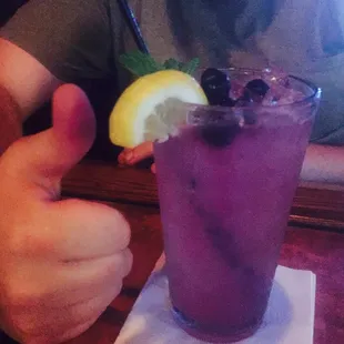 a man giving a thumbs up