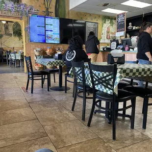 The menu board on the left and the main counter.
