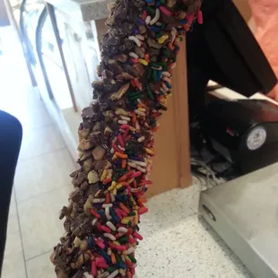 Frozen banana with English toffee and sprinkles