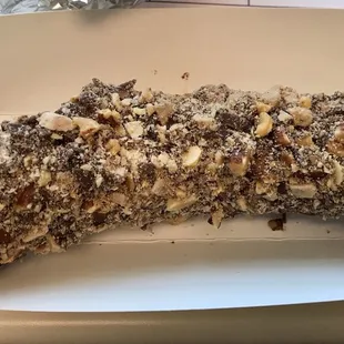 Frozen banana dipped in chocolate and peanuts. So yummy and loaded with peanuts! Perfect for a hot summer treat