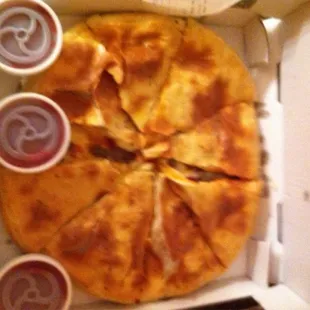 a whole pizza in a box