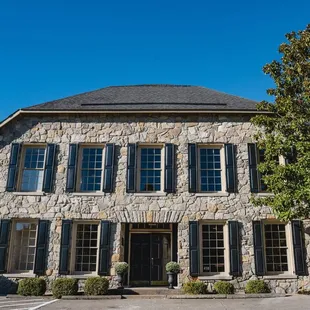 the front of a stone building