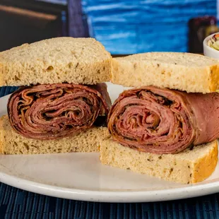 a plate of deli sandwiches