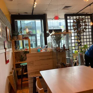 a man sitting at a table in a restaurant