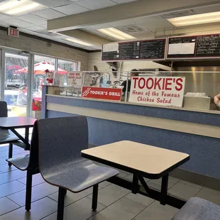 empty tables and chairs in a restaurant