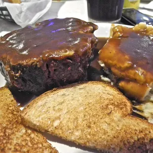 Generous helping of meatloaf served with mashed potatoes, toast and coleslaw. Very good!!
