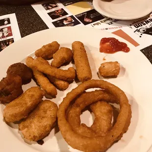 Burned mushrooms, onion rings, chicken nuggets, chicken fries $7.99