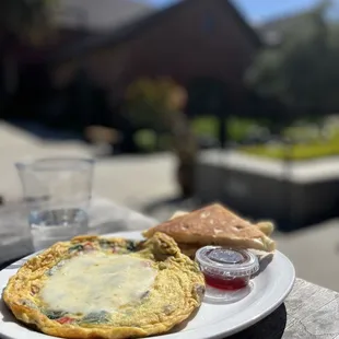 a plate of food on a picnic table