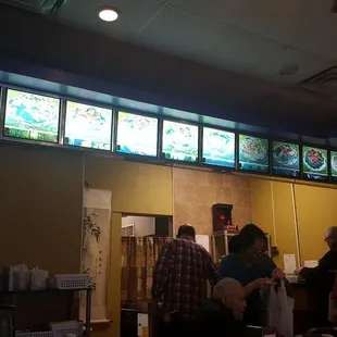 a group of people in a restaurant