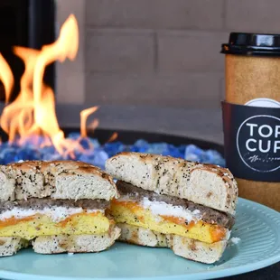 a breakfast sandwich and a cup of coffee