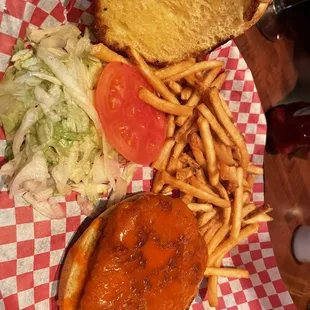 Frozen buffalo chicken, meager shoestring fries and a pile of lettuce.