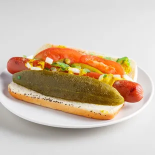 a hot dog with pickles and mustard