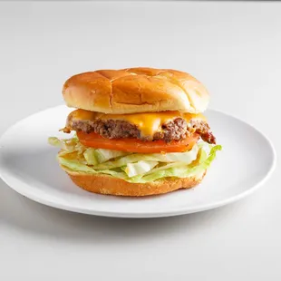 a hamburger on a white plate