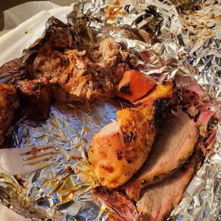 The $38.00 sampling plate in progress. This box served 4 people in my party.