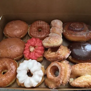 Two jelly, two glazed, two crullers, one sugar twist, two old fashioned, one cinnamon roll, one custard, one glazed buttermilk. All perfect.