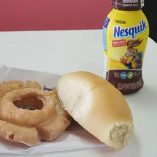 Old fashioned,  chocolate milk,  and a sausage and cheese kolache.