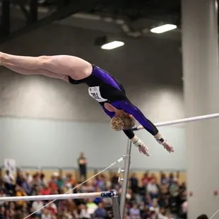 Monica 2nd Place in bars at Level 10 JO National Championships.