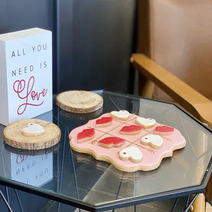 a glass table with cookies on it