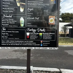 a menu on the side of the road