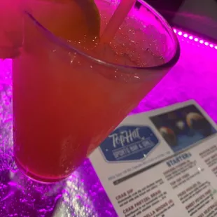 a drink with a slice of lemon