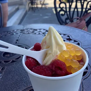 Pineapple dole whip with mango boba and raspberries