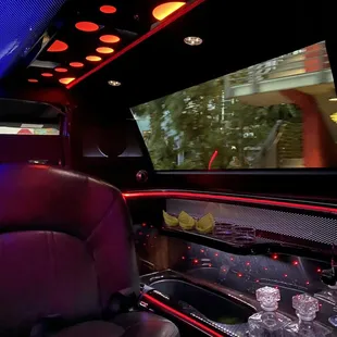 Interior nice and clean with fun colorful lights and water provided