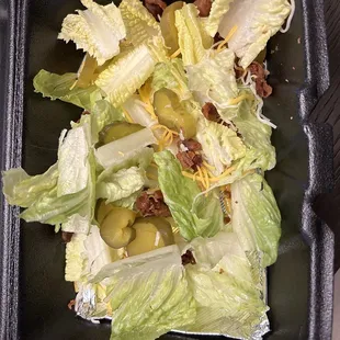 Burger toppings they call a side salad