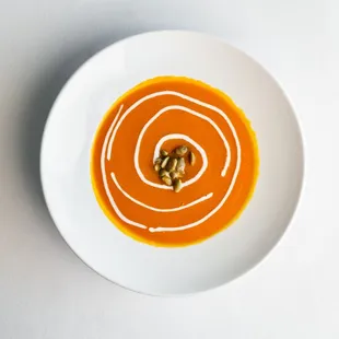 Carrot Ginger Soup, sage crème, pepitas