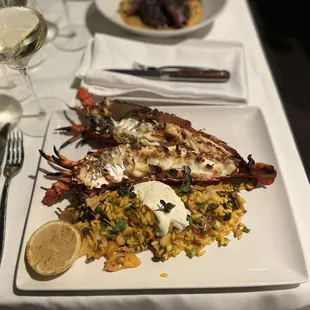 a plate of seafood and rice