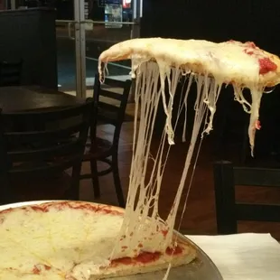 They don&apos;t mess around when you order extra cheese.