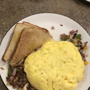 4 Egg Omelette that contained ham, mushrooms, sausage, onion, peppers and cheese.