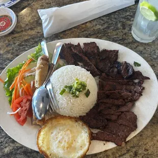 51A. Com Bo Nuong Cha Gio Plate