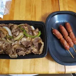 Cumin lamb and mini sausage skewers.